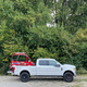 Image for article titled The 2021 Ford F-250 Lariat Tremor With A Ramp Kit Makes A Pretty Great Way To Haul A Changli Across The Country